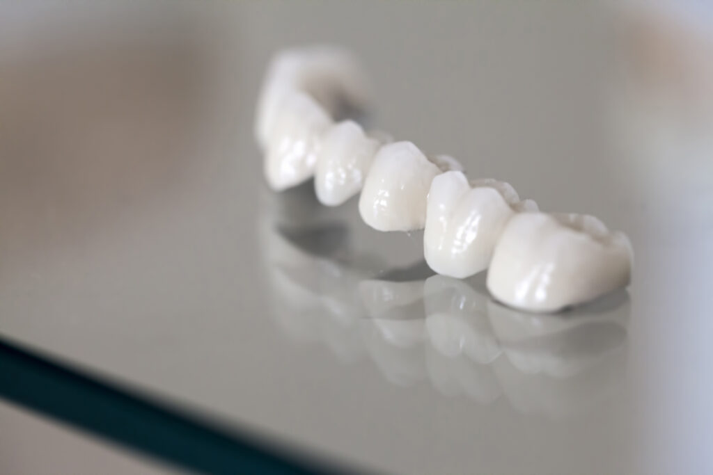 Zirconium Porcelain Tooth plate in Dentist Store Photo